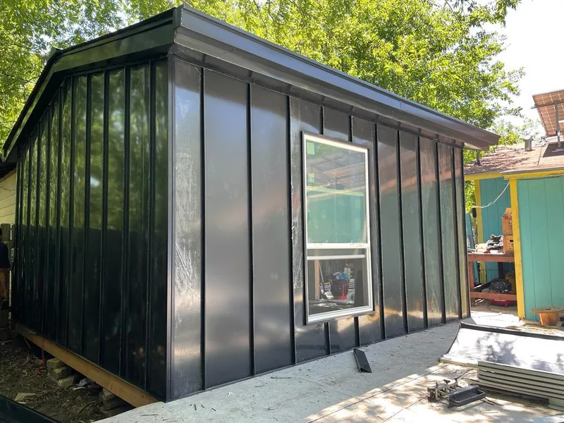 Black standing seam metal wall panels for Roof Inspection in Pinewood